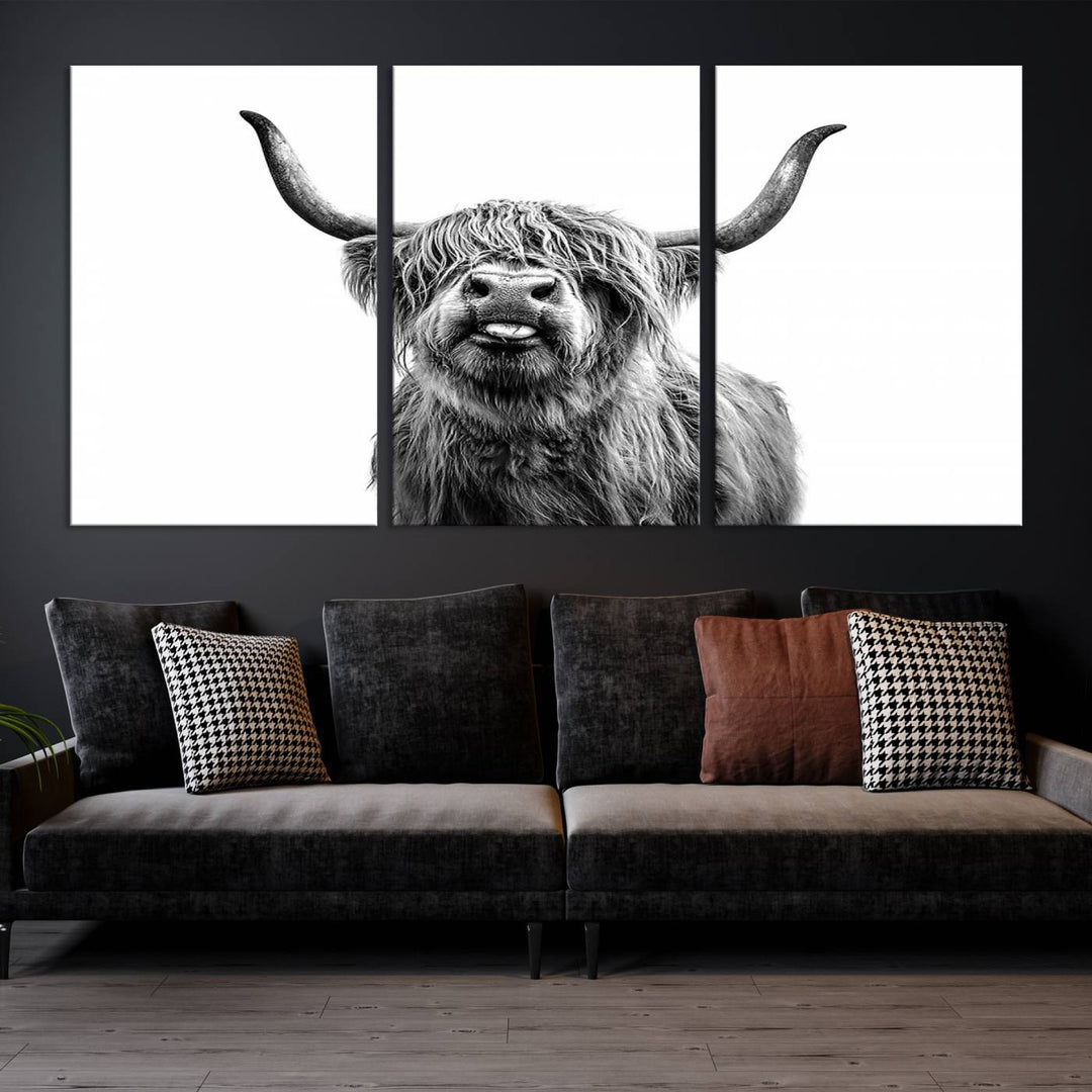 The living room features the Fanny Scottish Highland Cow Cattle Art Print Farmhouse Wall Art Canvas Print, a three-panel museum-quality artwork displayed against a dark wall.