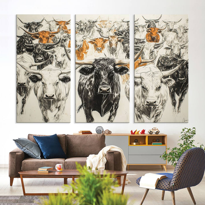 This exquisite farmhouse wall art, titled "Western Longhorn Cattle Canvas Print," showcases a majestic herd of longhorn cattle in a three-panel design. This ready-to-hang and framed barn decor infuses your space with rustic charm.