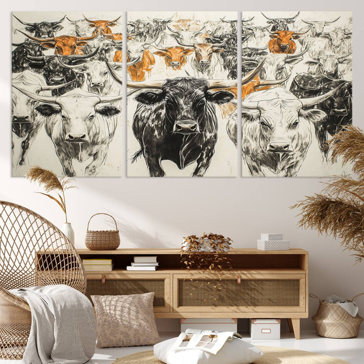 This exquisite farmhouse wall art, titled "Western Longhorn Cattle Canvas Print," showcases a majestic herd of longhorn cattle in a three-panel design. This ready-to-hang and framed barn decor infuses your space with rustic charm.