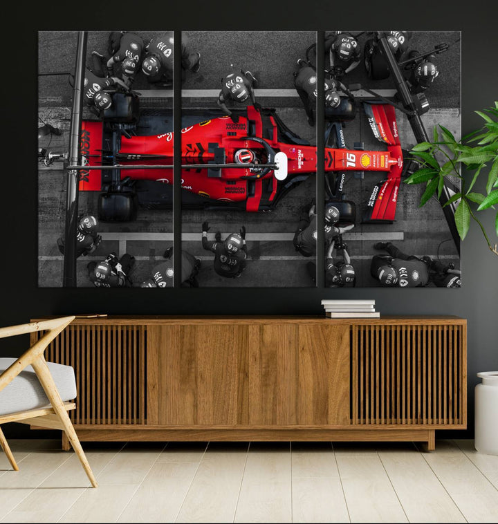 The Ferrari Pit Stop Canvas Wall Art features bold motorsport imagery that captures the precision and speed of Formula 1.