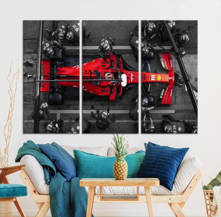 The Ferrari Pit Stop Canvas Wall Art features bold motorsport imagery that captures the precision and speed of Formula 1.