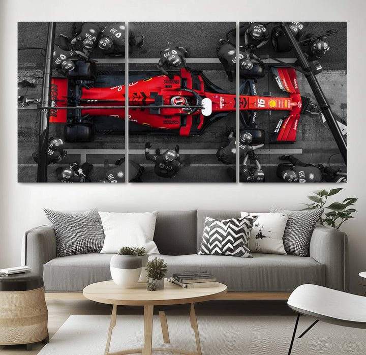 The Ferrari Pit Stop Canvas Wall Art features bold motorsport imagery that captures the precision and speed of Formula 1.