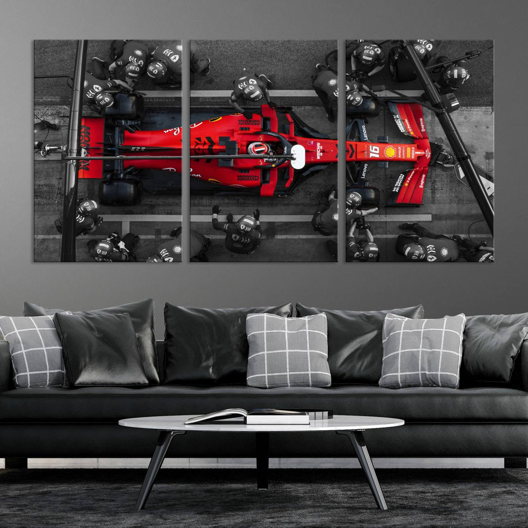 The Ferrari Pit Stop Canvas Wall Art features bold motorsport imagery that captures the precision and speed of Formula 1.