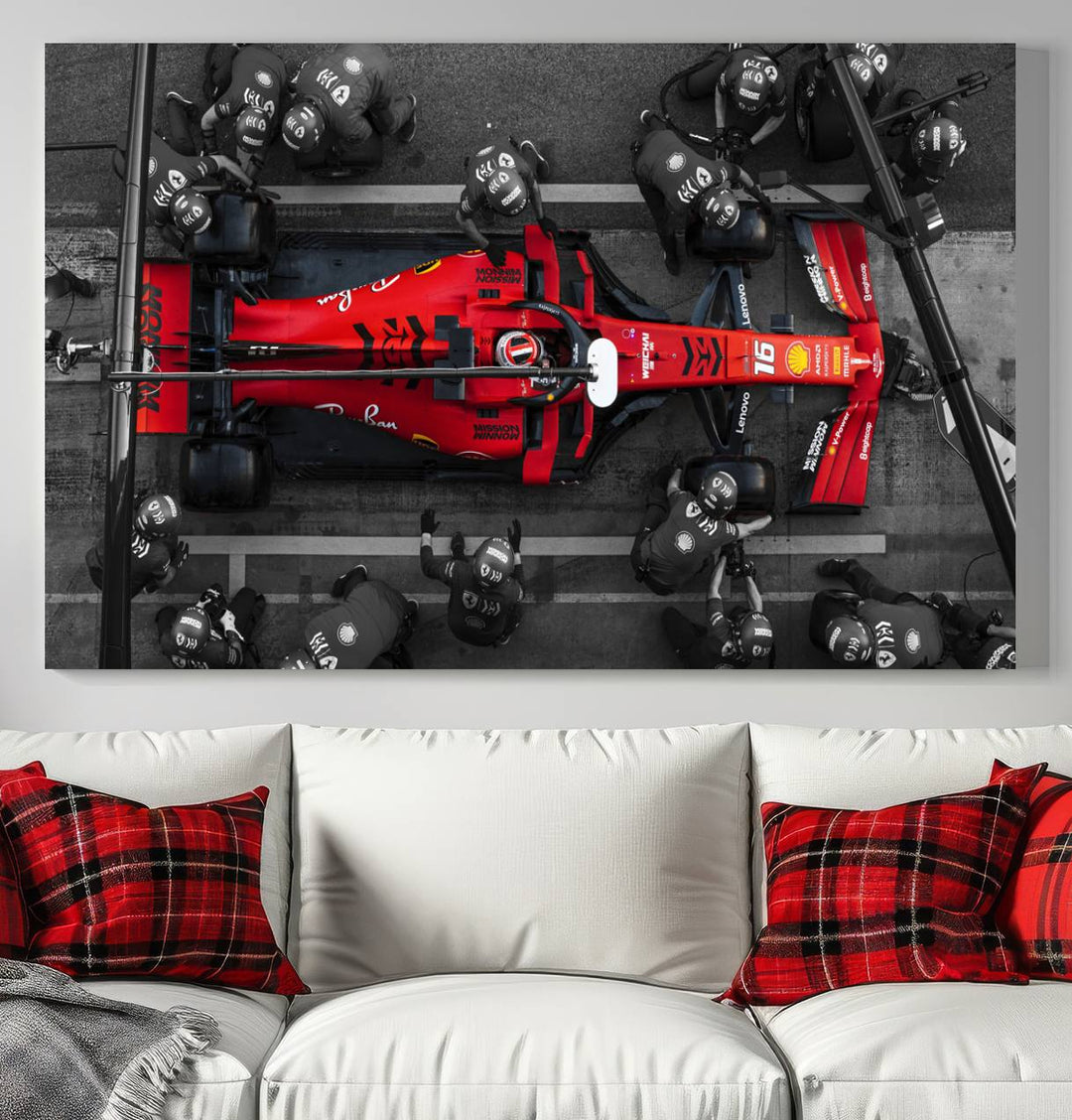 The Ferrari Pit Stop Canvas Wall Art features bold motorsport imagery that captures the precision and speed of Formula 1.