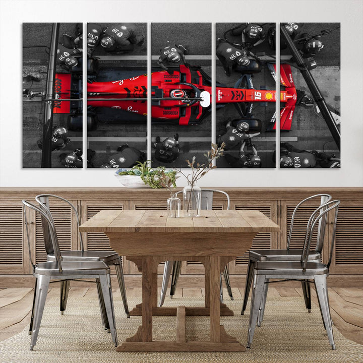 The Ferrari Pit Stop Canvas Wall Art features bold motorsport imagery that captures the precision and speed of Formula 1.