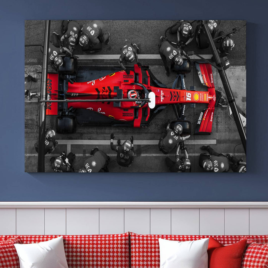 The Ferrari Pit Stop Canvas Wall Art features bold motorsport imagery that captures the precision and speed of Formula 1.