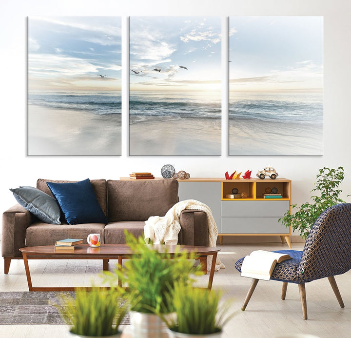 The Flight Over Coastal Beach Landscape Photography Print, a triptych of a serene ocean and sky scene with seagulls on museum-quality canvas, captivates as it hangs prominently in any space. Enjoy free shipping on this captivating piece that transforms any room into a tranquil retreat.