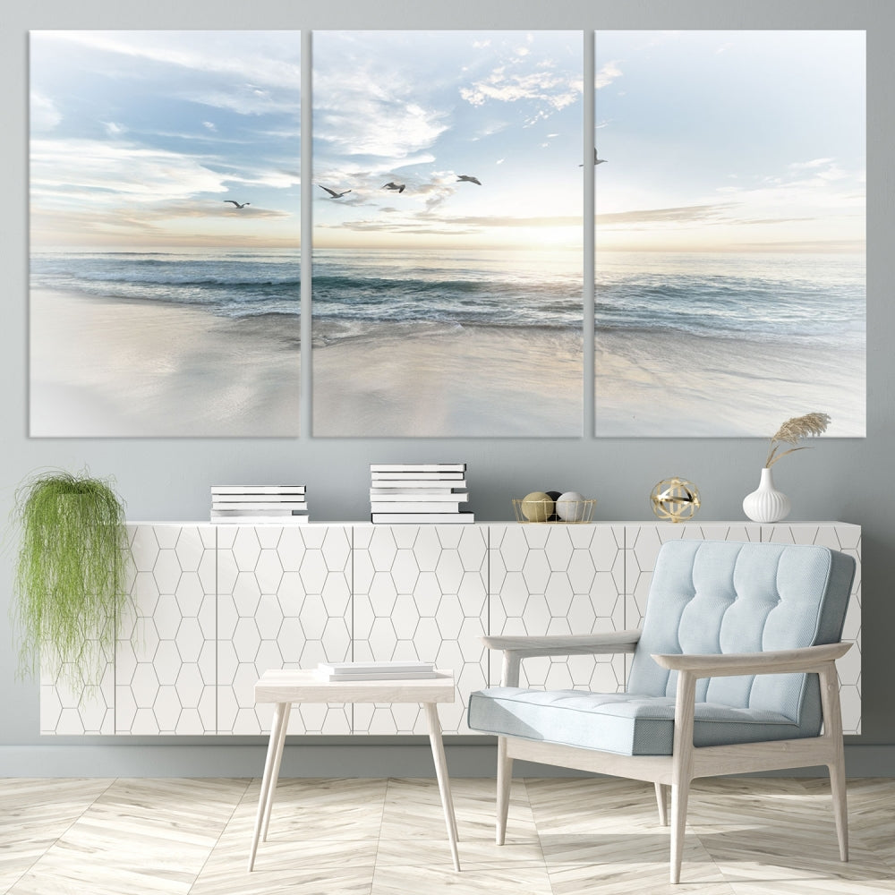 The Flight Over Coastal Beach Landscape Photography Print, a triptych of a serene ocean and sky scene with seagulls on museum-quality canvas, captivates as it hangs prominently in any space. Enjoy free shipping on this captivating piece that transforms any room into a tranquil retreat.