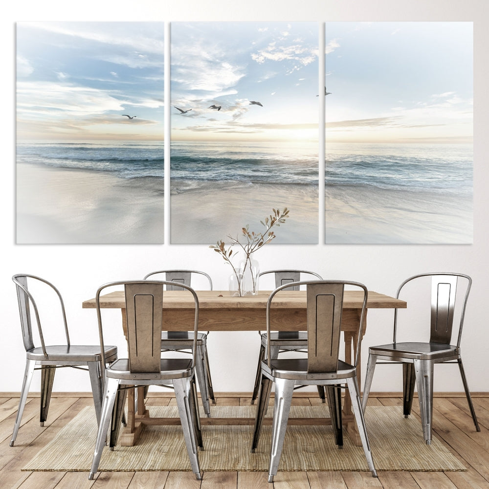 The Flight Over Coastal Beach Landscape Photography Print, a triptych of a serene ocean and sky scene with seagulls on museum-quality canvas, captivates as it hangs prominently in any space. Enjoy free shipping on this captivating piece that transforms any room into a tranquil retreat.