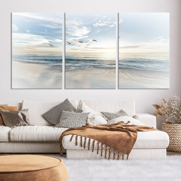 The Flight Over Coastal Beach Landscape Photography Print, a triptych of a serene ocean and sky scene with seagulls on museum-quality canvas, captivates as it hangs prominently in any space. Enjoy free shipping on this captivating piece that transforms any room into a tranquil retreat.