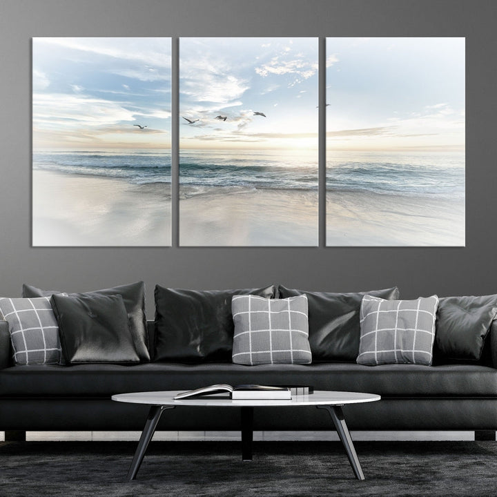 The Flight Over Coastal Beach Landscape Photography Print, a triptych of a serene ocean and sky scene with seagulls on museum-quality canvas, captivates as it hangs prominently in any space. Enjoy free shipping on this captivating piece that transforms any room into a tranquil retreat.