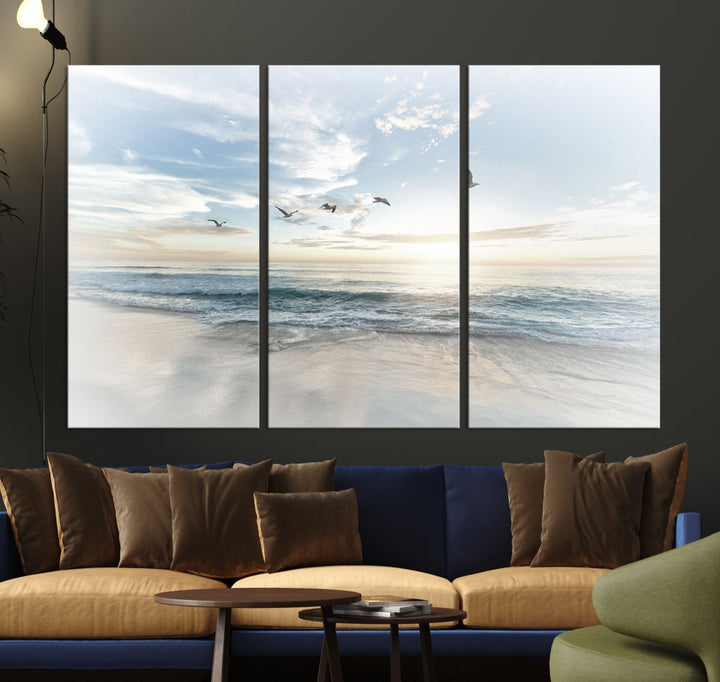 The Flight Over Coastal Beach Landscape Photography Print, a triptych of a serene ocean and sky scene with seagulls on museum-quality canvas, captivates as it hangs prominently in any space. Enjoy free shipping on this captivating piece that transforms any room into a tranquil retreat.