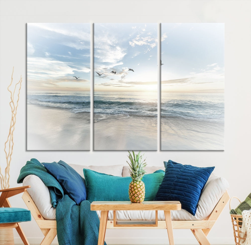 The Flight Over Coastal Beach Landscape Photography Print, a triptych of a serene ocean and sky scene with seagulls on museum-quality canvas, captivates as it hangs prominently in any space. Enjoy free shipping on this captivating piece that transforms any room into a tranquil retreat.