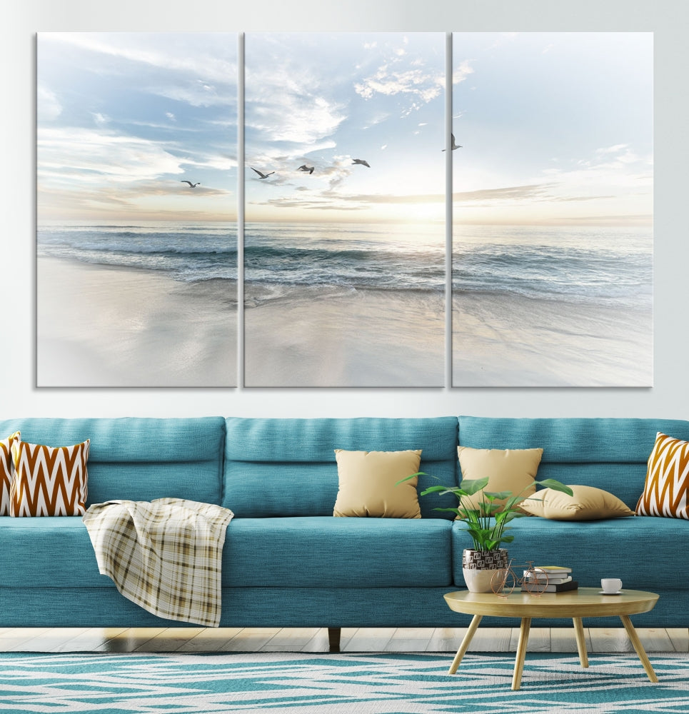 The Flight Over Coastal Beach Landscape Photography Print, a triptych of a serene ocean and sky scene with seagulls on museum-quality canvas, captivates as it hangs prominently in any space. Enjoy free shipping on this captivating piece that transforms any room into a tranquil retreat.