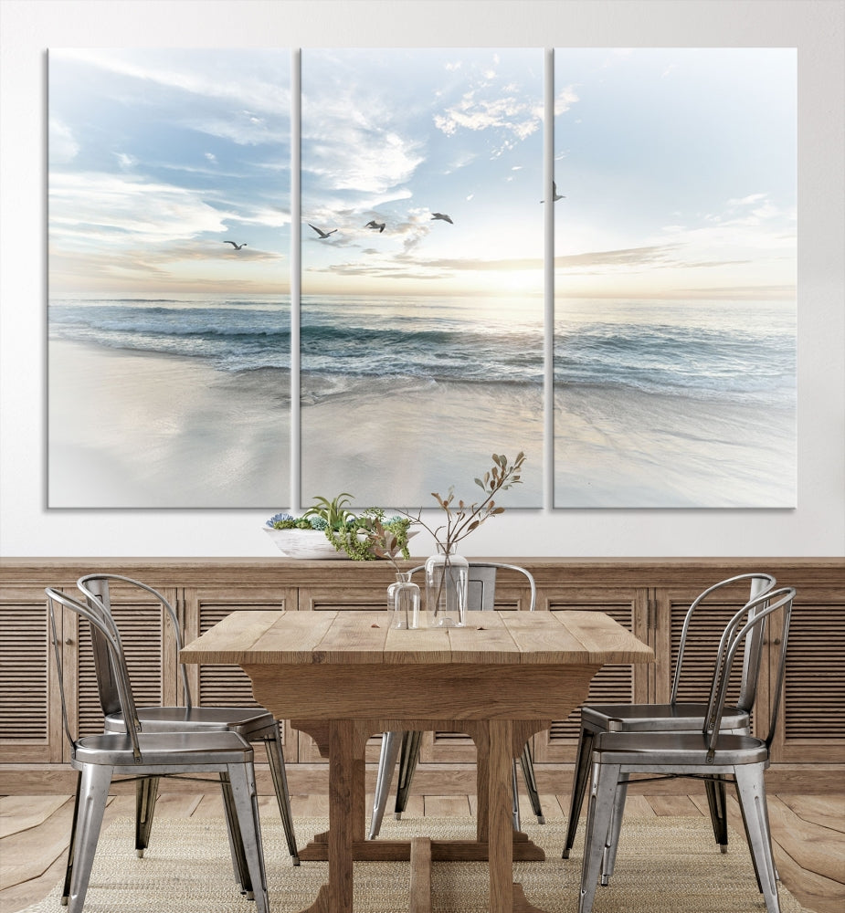 The Flight Over Coastal Beach Landscape Photography Print, a triptych of a serene ocean and sky scene with seagulls on museum-quality canvas, captivates as it hangs prominently in any space. Enjoy free shipping on this captivating piece that transforms any room into a tranquil retreat.