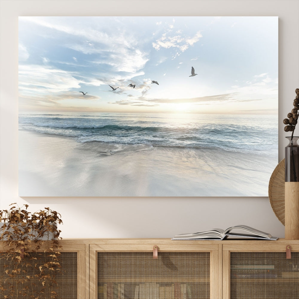 The Flight Over Coastal Beach Landscape Photography Print, a triptych of a serene ocean and sky scene with seagulls on museum-quality canvas, captivates as it hangs prominently in any space. Enjoy free shipping on this captivating piece that transforms any room into a tranquil retreat.