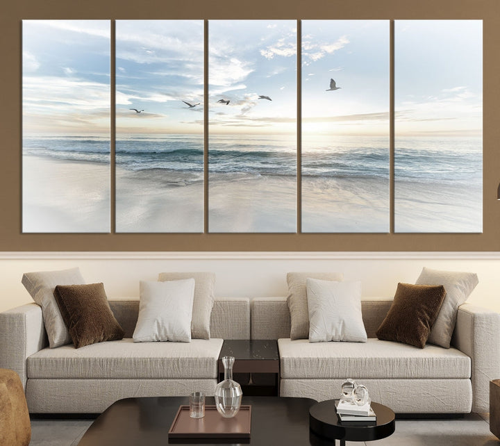 The Flight Over Coastal Beach Landscape Photography Print, a triptych of a serene ocean and sky scene with seagulls on museum-quality canvas, captivates as it hangs prominently in any space. Enjoy free shipping on this captivating piece that transforms any room into a tranquil retreat.