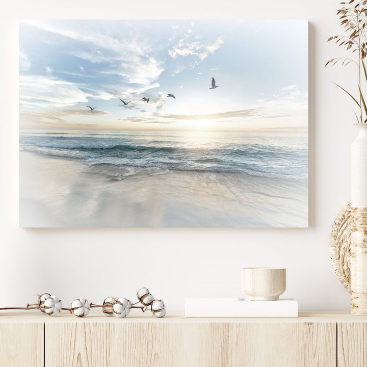 The Flight Over Coastal Beach Landscape Photography Print, a triptych of a serene ocean and sky scene with seagulls on museum-quality canvas, captivates as it hangs prominently in any space. Enjoy free shipping on this captivating piece that transforms any room into a tranquil retreat.