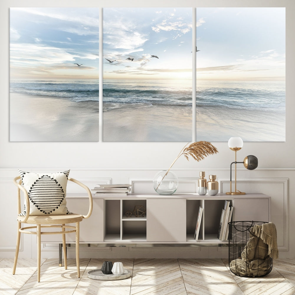 The Flight Over Coastal Beach Landscape Photography Print, a triptych of a serene ocean and sky scene with seagulls on museum-quality canvas, captivates as it hangs prominently in any space. Enjoy free shipping on this captivating piece that transforms any room into a tranquil retreat.