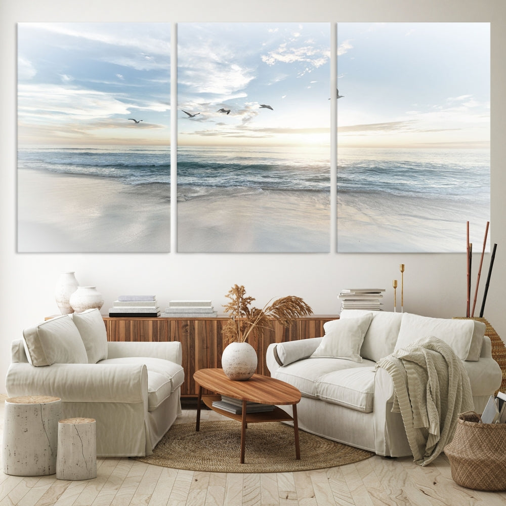 The Flight Over Coastal Beach Landscape Photography Print, a triptych of a serene ocean and sky scene with seagulls on museum-quality canvas, captivates as it hangs prominently in any space. Enjoy free shipping on this captivating piece that transforms any room into a tranquil retreat.