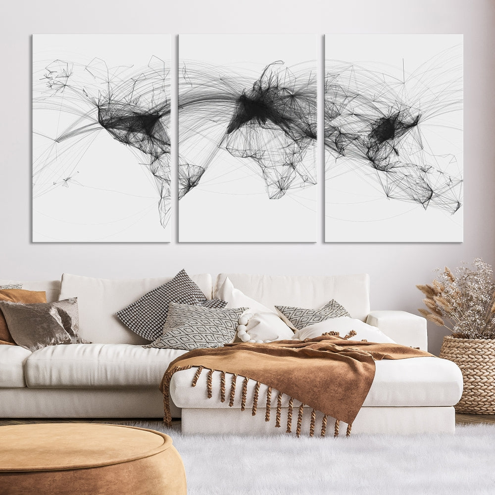 The "Flight Routes Air Traffic World Map" canvas wall art, featuring a triptych with abstract black line designs reminiscent of intricate flight paths, beautifies the wall. This framed, ready-to-hang piece adds a sophisticated touch to the living space.