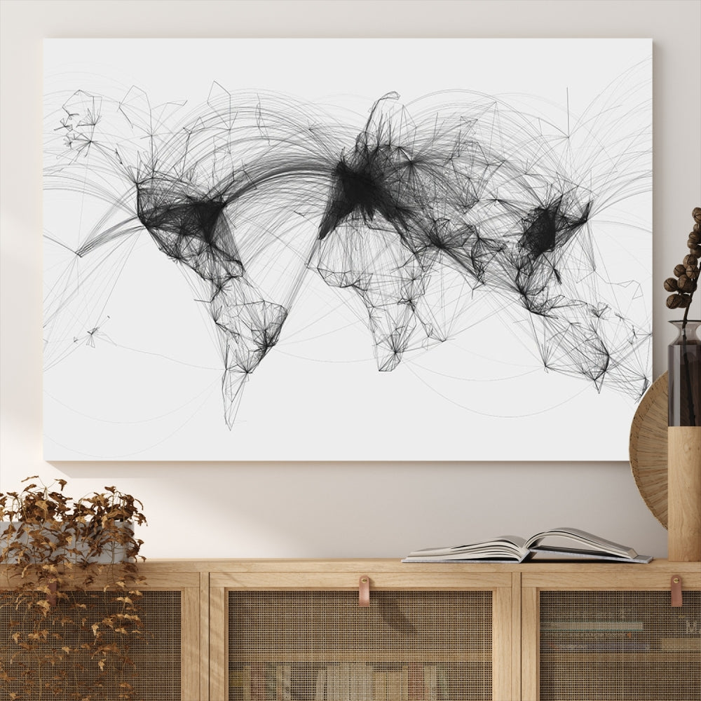 The "Flight Routes Air Traffic World Map" canvas wall art, featuring a triptych with abstract black line designs reminiscent of intricate flight paths, beautifies the wall. This framed, ready-to-hang piece adds a sophisticated touch to the living space.