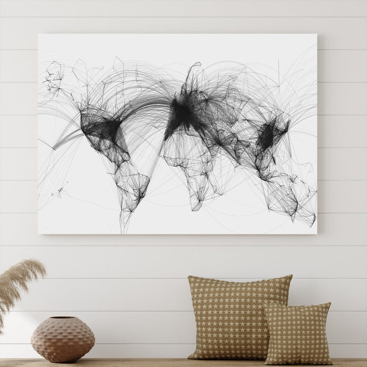 The "Flight Routes Air Traffic World Map" canvas wall art, featuring a triptych with abstract black line designs reminiscent of intricate flight paths, beautifies the wall. This framed, ready-to-hang piece adds a sophisticated touch to the living space.