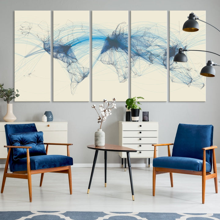 The Flight Routes Map art, featuring an abstract world map with blue connections representing global networks, is a three-panel canvas wall art piece.