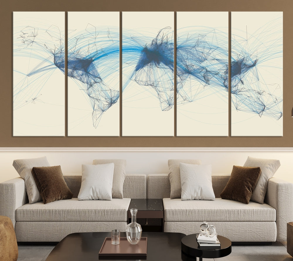 The Flight Routes Map art, featuring an abstract world map with blue connections representing global networks, is a three-panel canvas wall art piece.