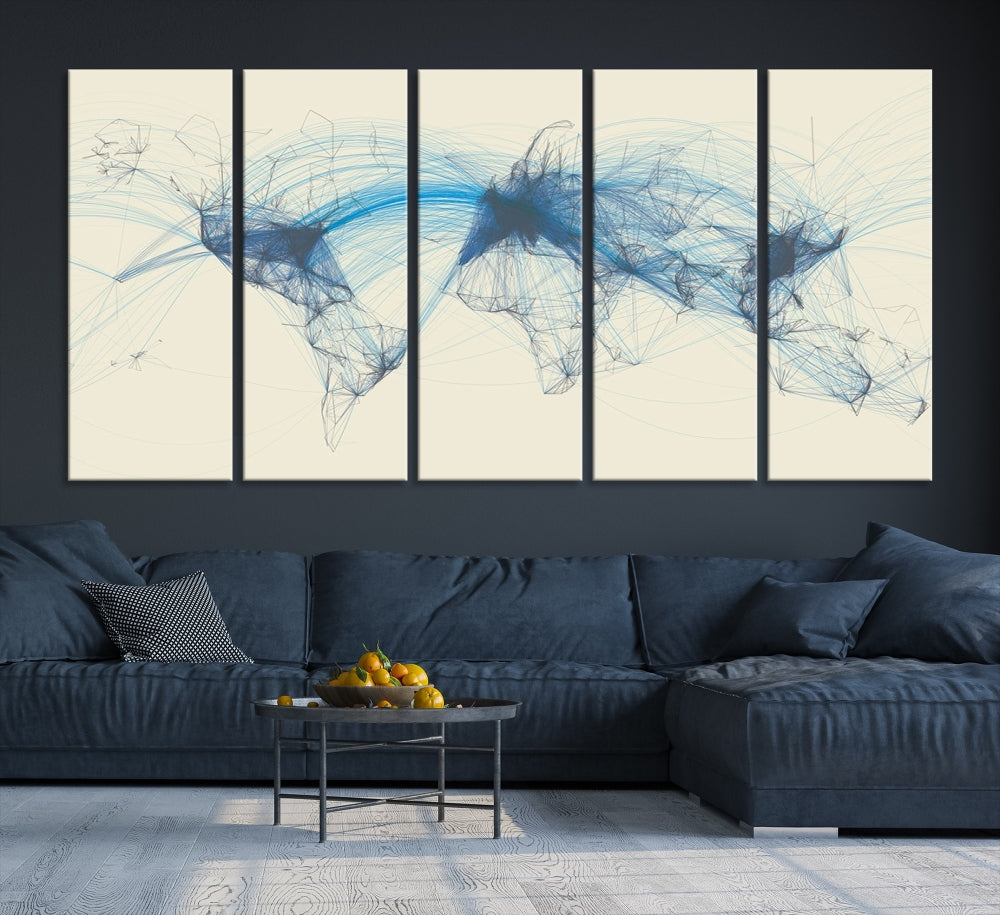 The Flight Routes Map art, featuring an abstract world map with blue connections representing global networks, is a three-panel canvas wall art piece.