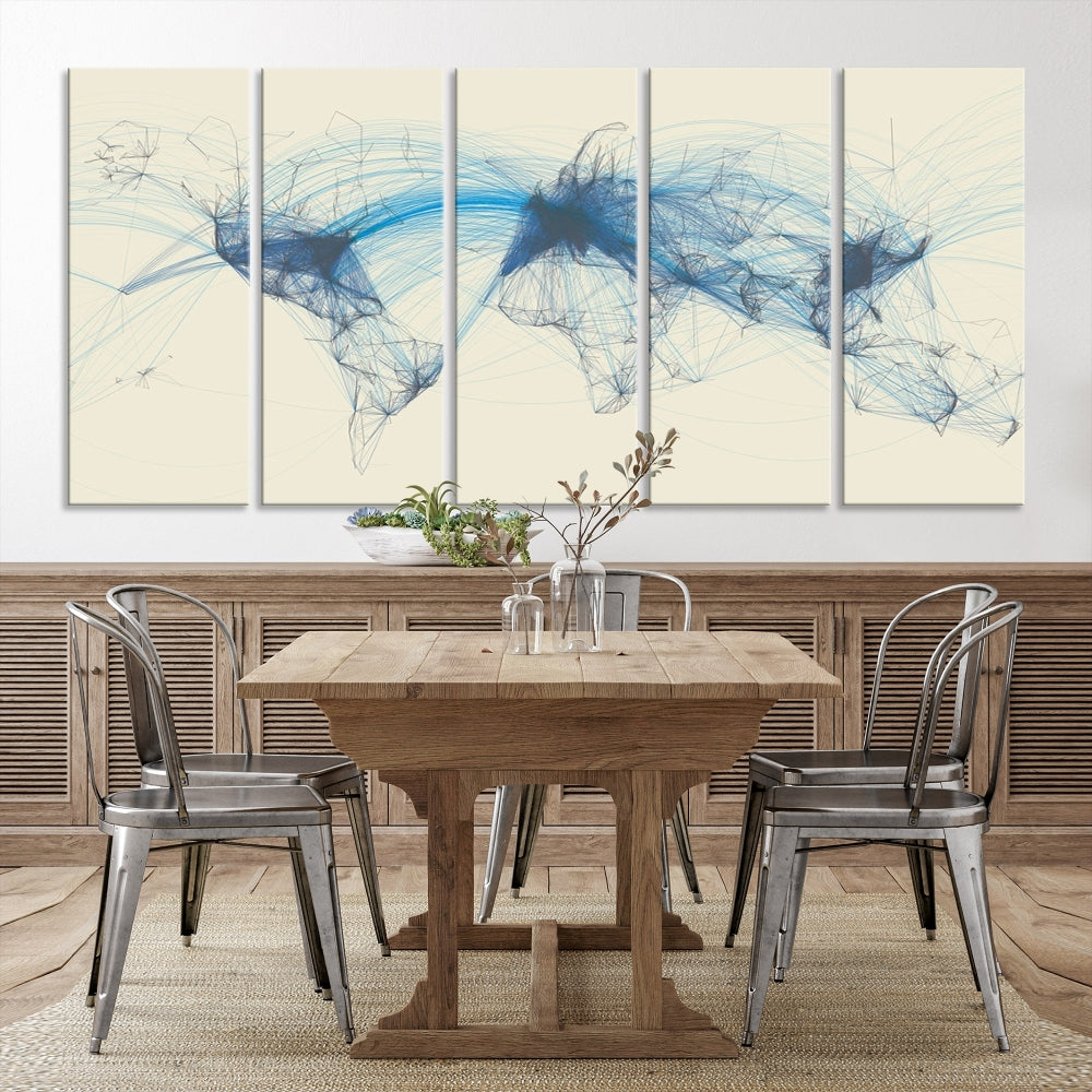 The Flight Routes Map art, featuring an abstract world map with blue connections representing global networks, is a three-panel canvas wall art piece.