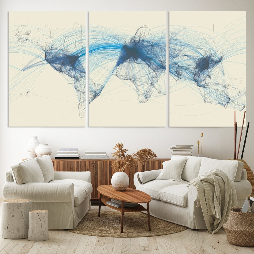 The Flight Routes Map art, featuring an abstract world map with blue connections representing global networks, is a three-panel canvas wall art piece.