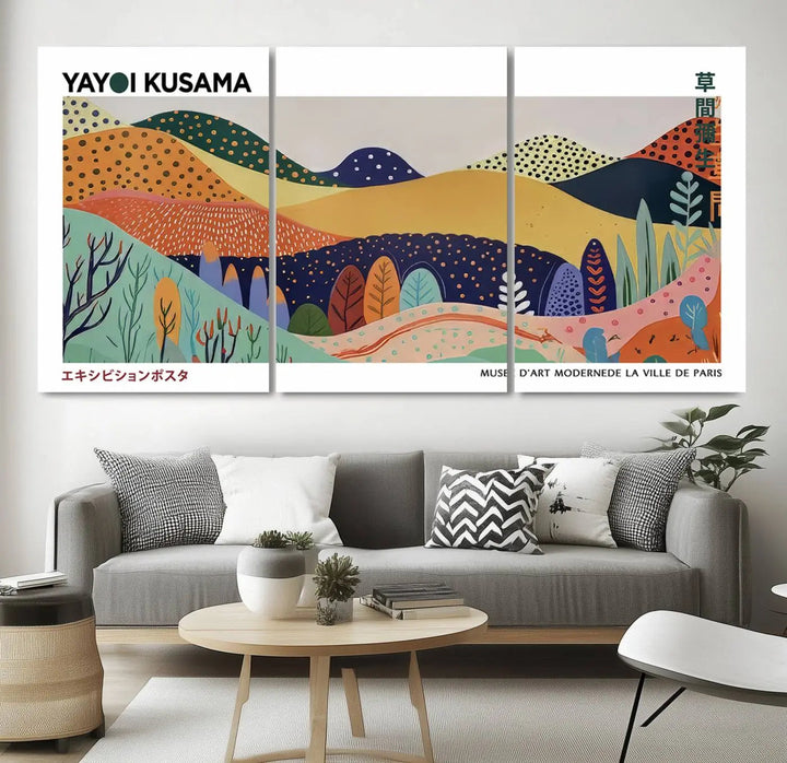 A triptych featuring the Framed Yayoi Kusama 1986 Wall Art Print hangs above. This Japanese Wabi Sabi inspired piece, rich in vibrant abstract landscapes, adds an elegant touch to any nature-inspired décor.