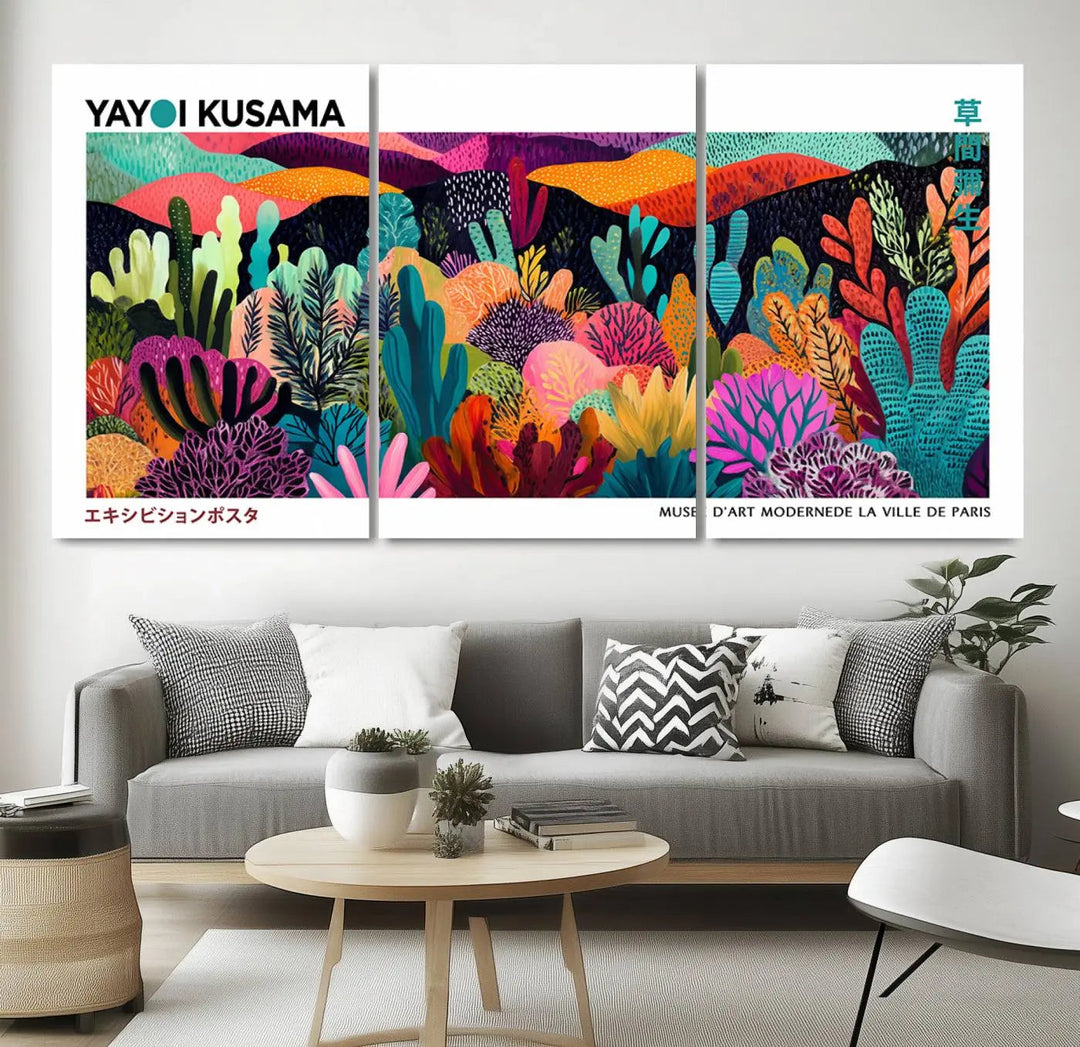 A cozy living room features colorful wall art, with the Framed Yayoi Kusama 1986 Wall Art Print taking center stage. This vibrant abstract landscape canvas seamlessly blends with the contemporary décor, creating a lively yet harmonious atmosphere.