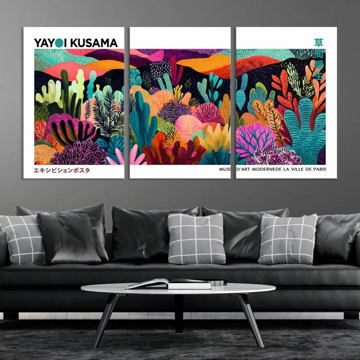 A cozy living room features colorful wall art, with the Framed Yayoi Kusama 1986 Wall Art Print taking center stage. This vibrant abstract landscape canvas seamlessly blends with the contemporary décor, creating a lively yet harmonious atmosphere.