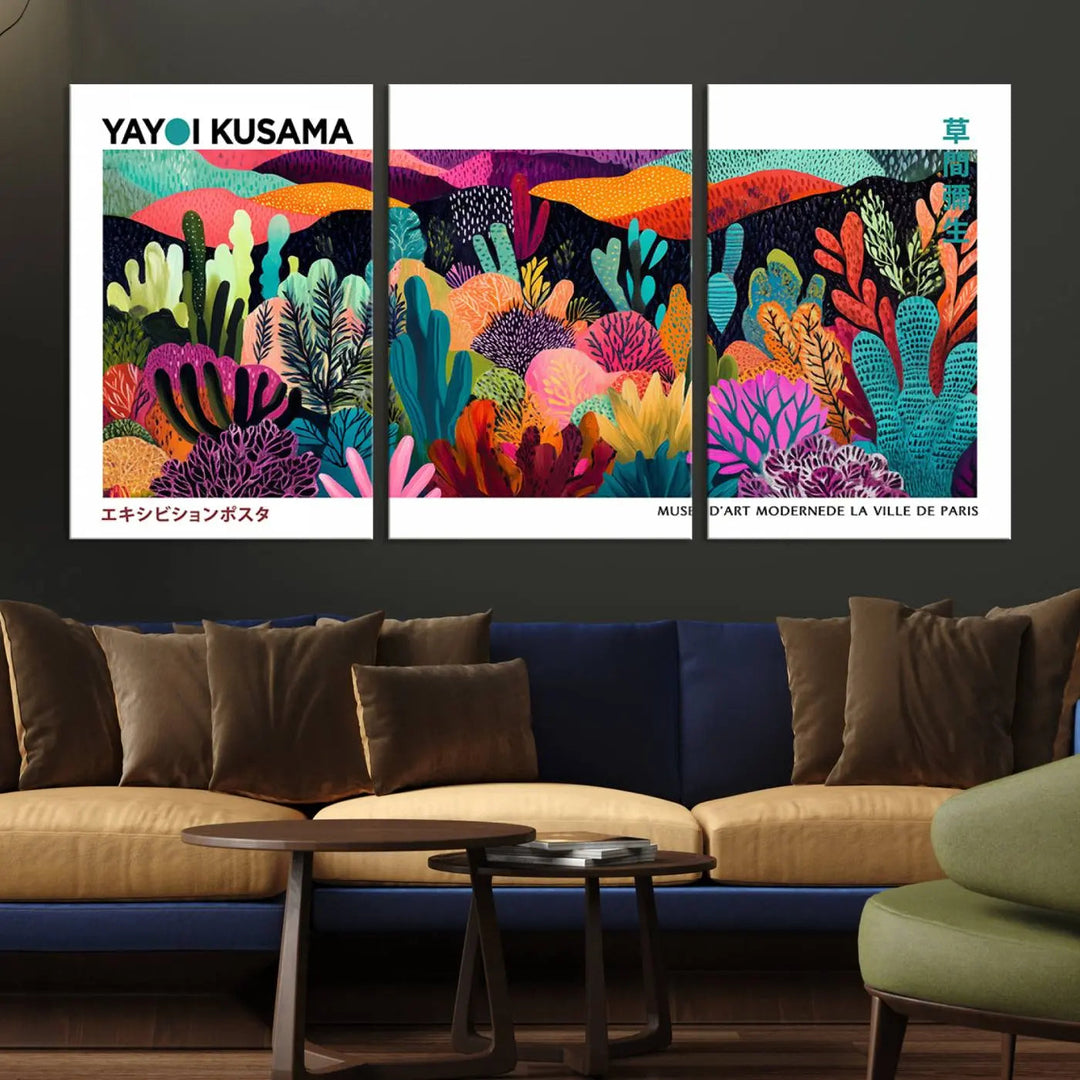 A cozy living room features colorful wall art, with the Framed Yayoi Kusama 1986 Wall Art Print taking center stage. This vibrant abstract landscape canvas seamlessly blends with the contemporary décor, creating a lively yet harmonious atmosphere.