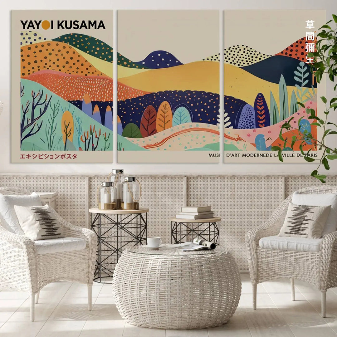 In a living room with contemporary décor, a vibrant abstract landscape by Yayoi Kusama from 1986 is prominently displayed.