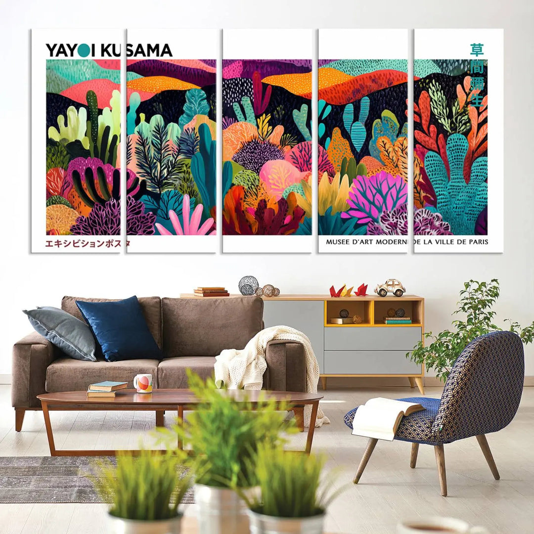 A cozy living room features colorful wall art, with the Framed Yayoi Kusama 1986 Wall Art Print taking center stage. This vibrant abstract landscape canvas seamlessly blends with the contemporary décor, creating a lively yet harmonious atmosphere.