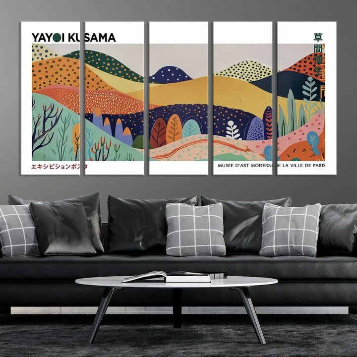 A triptych featuring the Framed Yayoi Kusama 1986 Wall Art Print hangs above. This Japanese Wabi Sabi inspired piece, rich in vibrant abstract landscapes, adds an elegant touch to any nature-inspired décor.