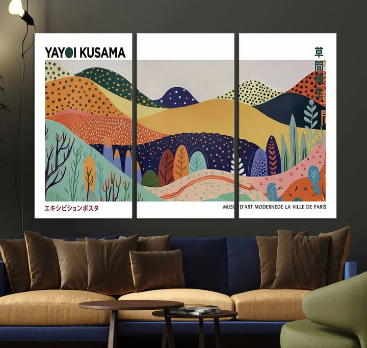 A triptych featuring the Framed Yayoi Kusama 1986 Wall Art Print hangs above. This Japanese Wabi Sabi inspired piece, rich in vibrant abstract landscapes, adds an elegant touch to any nature-inspired décor.