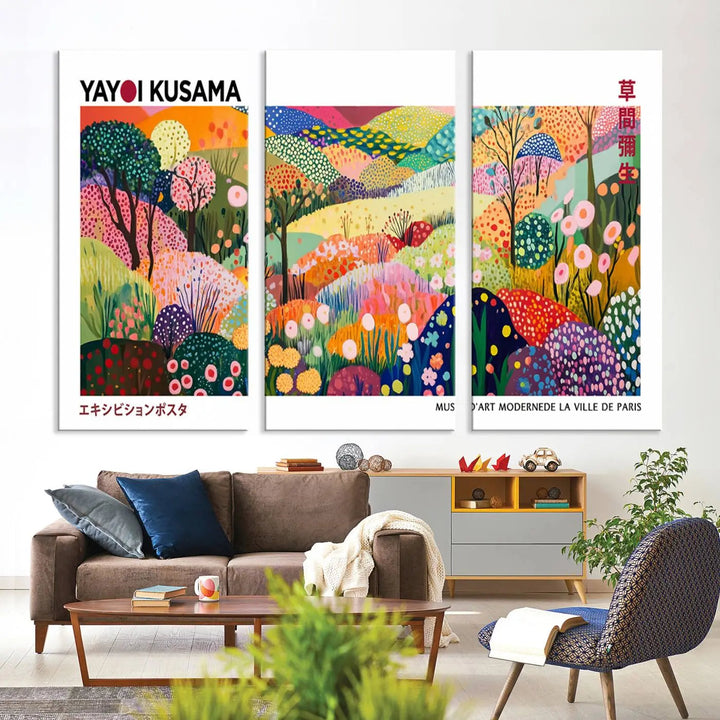 Three vibrant, abstract Yayoi Kusama wall art prints adorn a black wall, creating a perfect blend of contemporary décor.