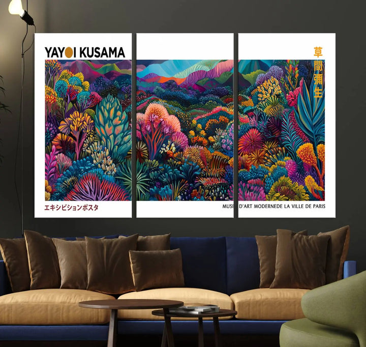 A set of three vibrant abstract landscape canvas prints, inspired by Yayoi Kusama's style and capturing a Japanese Wabi Sabi aesthetic, adorns the dark wall, creating a stunning piece of contemporary décor.