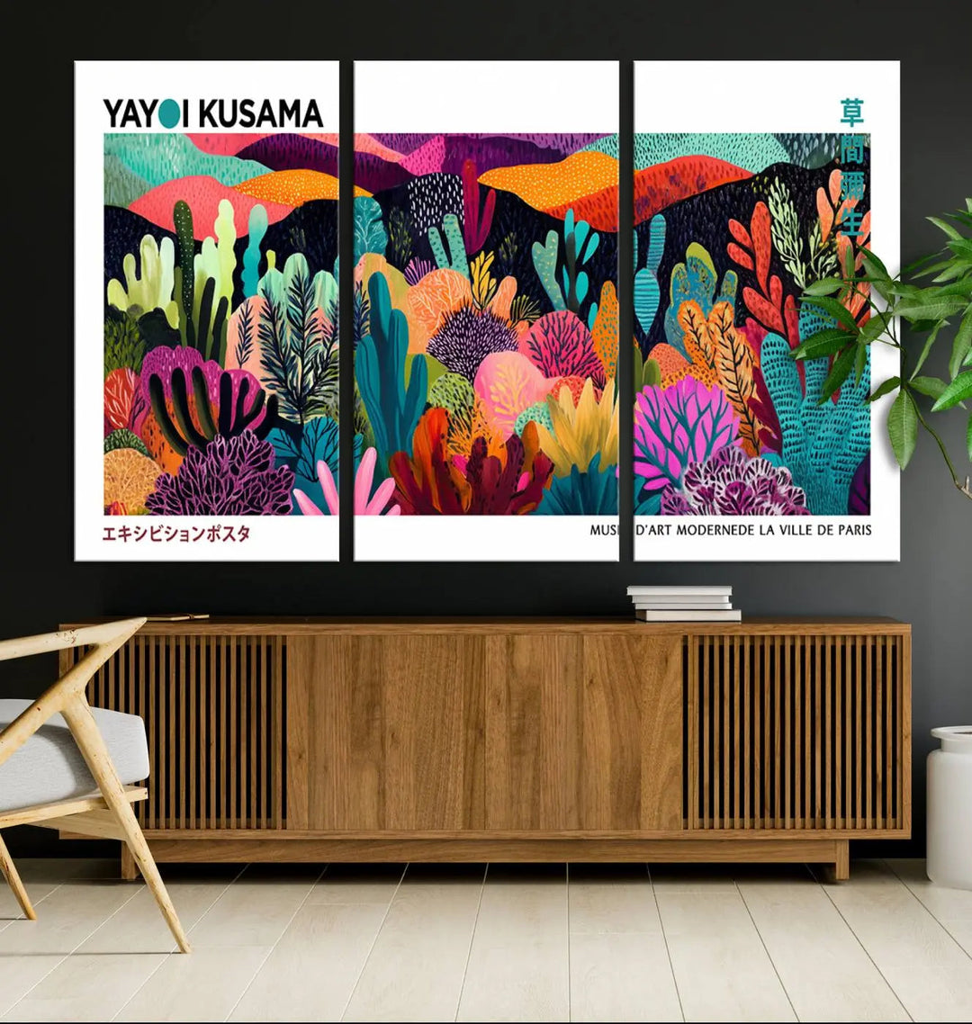 A cozy living room features colorful wall art, with the Framed Yayoi Kusama 1986 Wall Art Print taking center stage. This vibrant abstract landscape canvas seamlessly blends with the contemporary décor, creating a lively yet harmonious atmosphere.