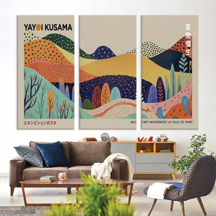 In a living room with contemporary décor, a vibrant abstract landscape by Yayoi Kusama from 1986 is prominently displayed.