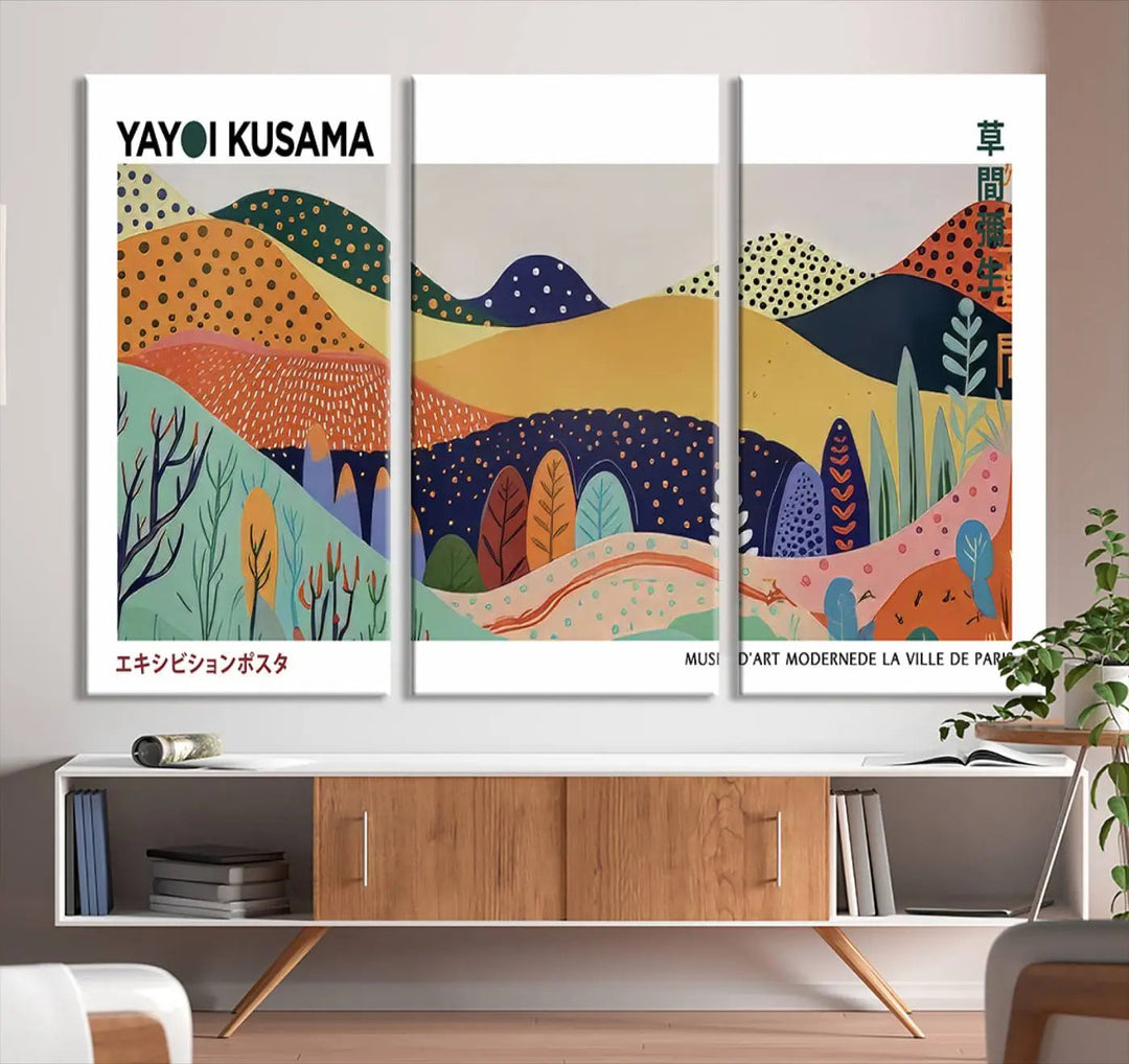 A triptych featuring the Framed Yayoi Kusama 1986 Wall Art Print hangs above. This Japanese Wabi Sabi inspired piece, rich in vibrant abstract landscapes, adds an elegant touch to any nature-inspired décor.