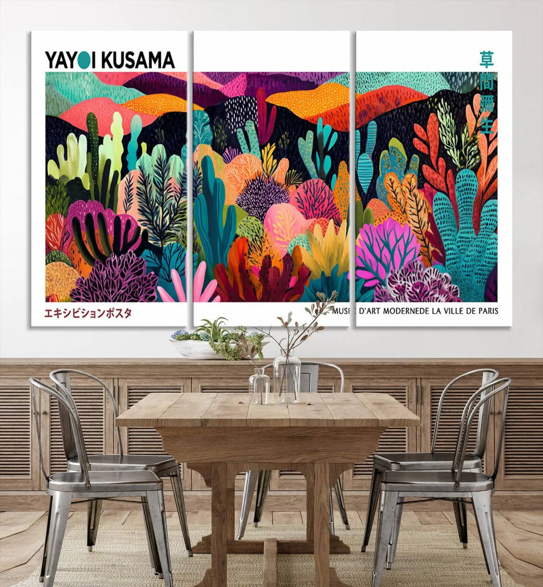 A cozy living room features colorful wall art, with the Framed Yayoi Kusama 1986 Wall Art Print taking center stage. This vibrant abstract landscape canvas seamlessly blends with the contemporary décor, creating a lively yet harmonious atmosphere.