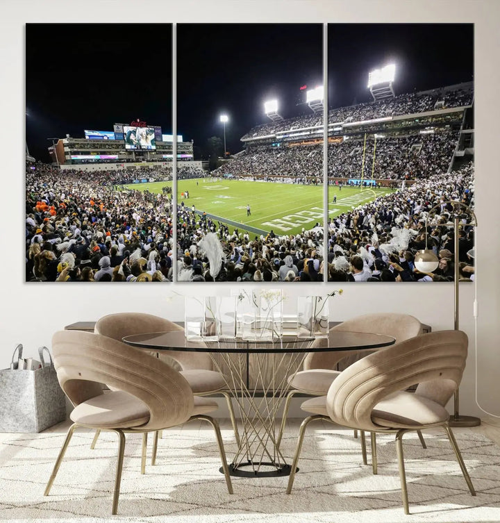 Showcased as premium wall art, this gallery-quality canvas features a print of the Georgia Tech Yellow Jackets Football Team at Atlanta's Bobby Dodd Stadium during a crowded, illuminated night game.