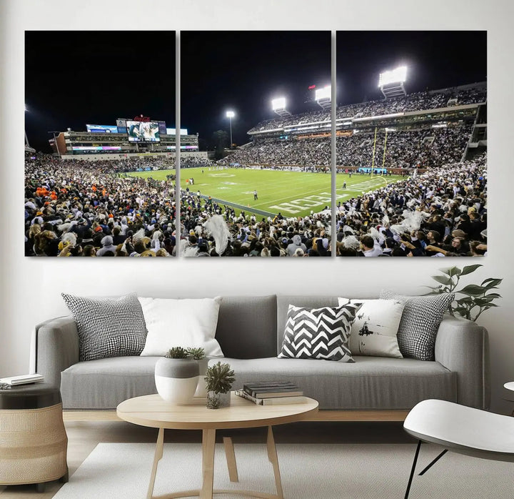 Showcased as premium wall art, this gallery-quality canvas features a print of the Georgia Tech Yellow Jackets Football Team at Atlanta's Bobby Dodd Stadium during a crowded, illuminated night game.