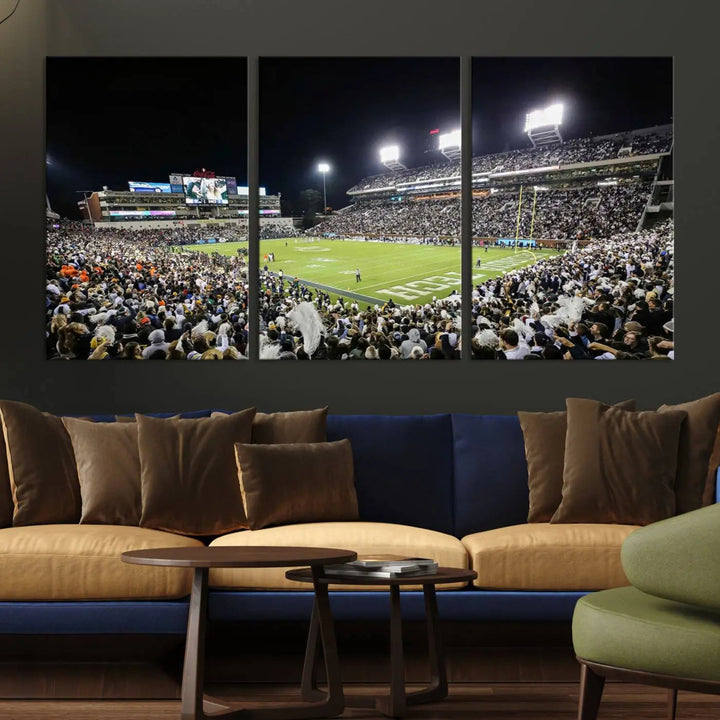 Showcased as premium wall art, this gallery-quality canvas features a print of the Georgia Tech Yellow Jackets Football Team at Atlanta's Bobby Dodd Stadium during a crowded, illuminated night game.