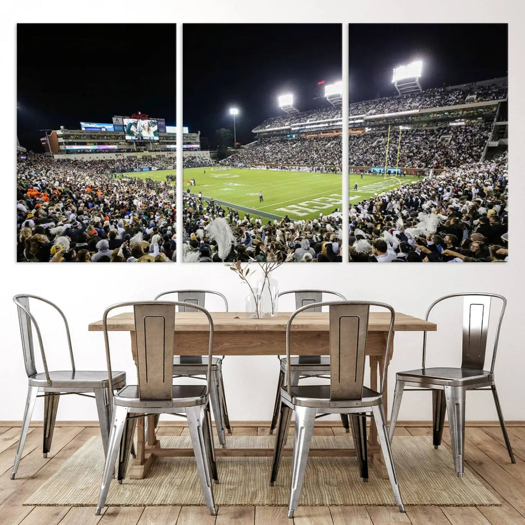 Showcased as premium wall art, this gallery-quality canvas features a print of the Georgia Tech Yellow Jackets Football Team at Atlanta's Bobby Dodd Stadium during a crowded, illuminated night game.